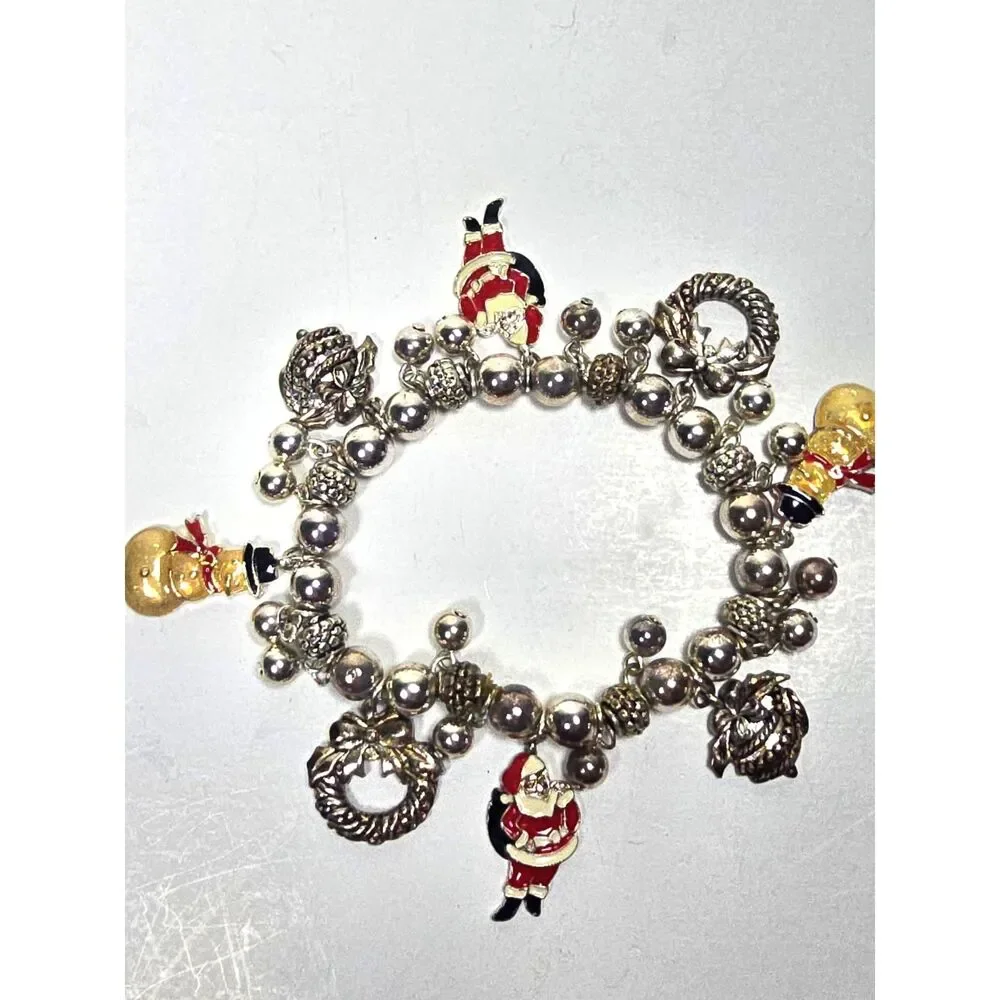 Avon Christmas Charm Bracelet Silver Tone Stretch Santa Snowman Wreath Jewelry